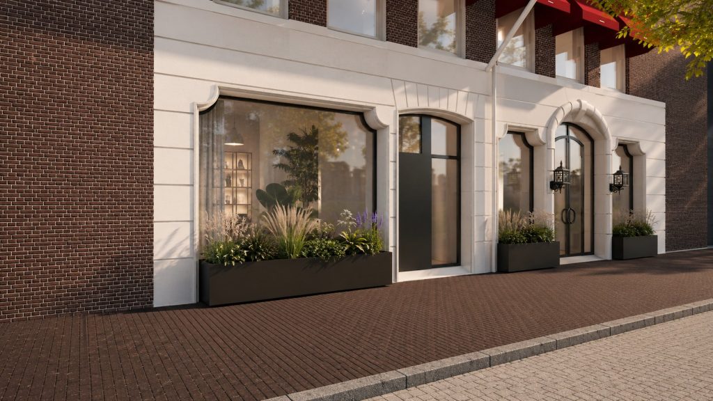 Detailbeeld van de gewijzigde winkelgevel met entree, gevelpuien en planter